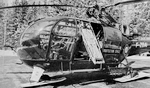 La civière Piguillem suspendue au treuil de l'Alouette 3 F-ZBAI Protection civile sur sa DZ à Chamonix au début des années 70 - Photo DR